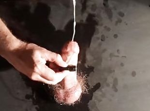 The guy made a homemade glory hole and came powerfully from a strong orgasm