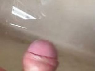 Soft Asian penis peeing in sink