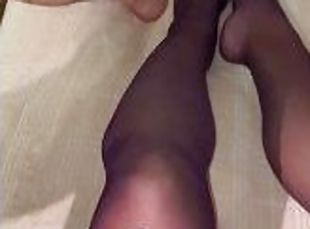 cumshot on stockings legs