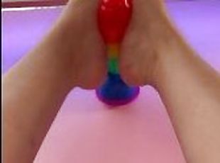 Giving my favorite rainbow cock a teasing footjob