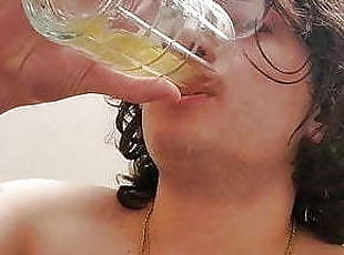 Drinking some nice yellow piss from a glass