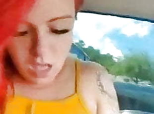 T girl playing in car