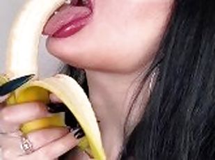 Alison Beth sucking banana with piercing long tongue