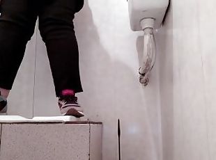 Hot milf pissing in public toilet