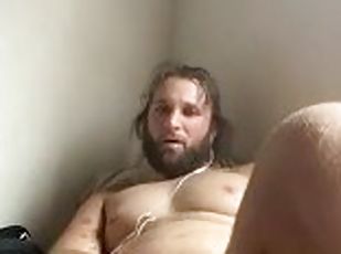 Hot bearded Italian man stroking thick cock to porn