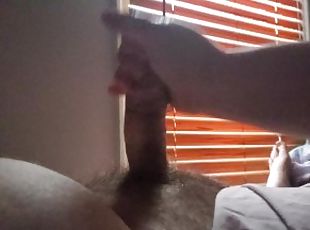 Jerking husband off until massive cum shot