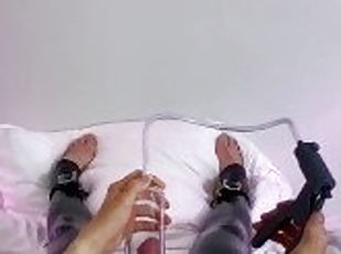 Latex boy pumps his cock hard with penis pump before jerking off