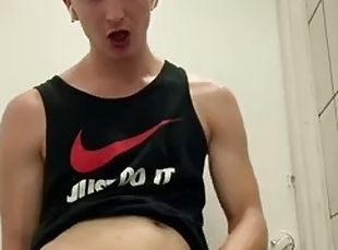 Teen boy masturbates in public in the subway bathroom and makes a huge cumshot
