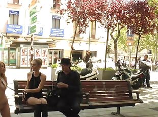 Naked blond hair girl kneeling in public streets