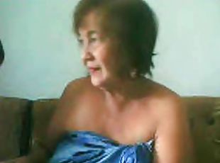 Fat granny asian lady on cam showing merchandise on cam