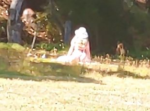 Voyeur watching horny slut use a fantasy dildo at the park. She needs a real one