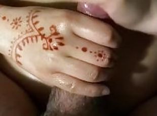 Indian girl with henna gives handjob to white cock cums all over tits
