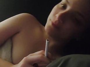 Laying next to your girlfriend as she smokes her morning cigarette POV