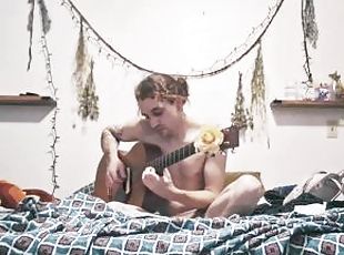 Your boyfriend playing music on your bed naked because he misses you