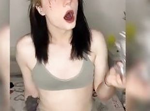 horny trans woman sucking a dildo